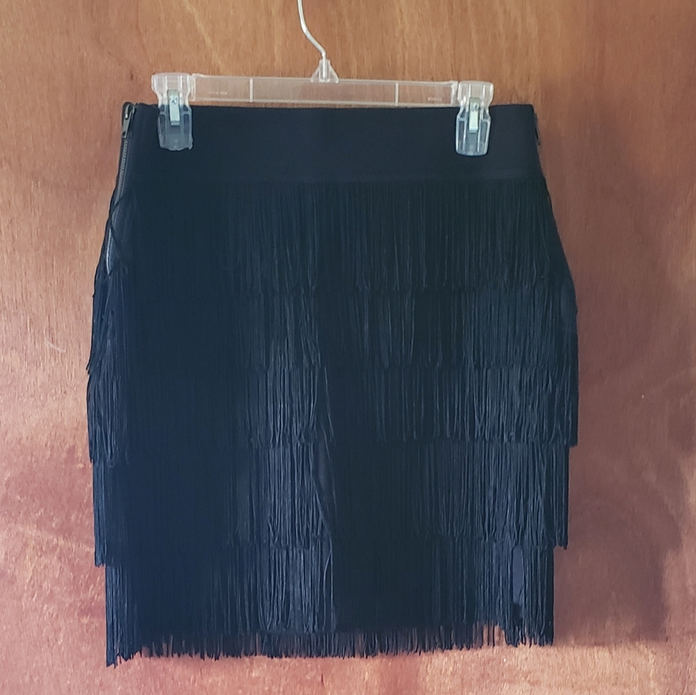 BCBG black mini skirt with fringe